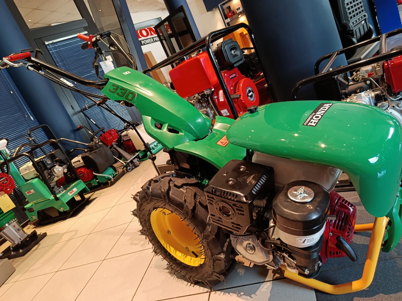 Honda BT330 Handheld Tractor & Accessories — Tiller, Reaper, Plow & More
