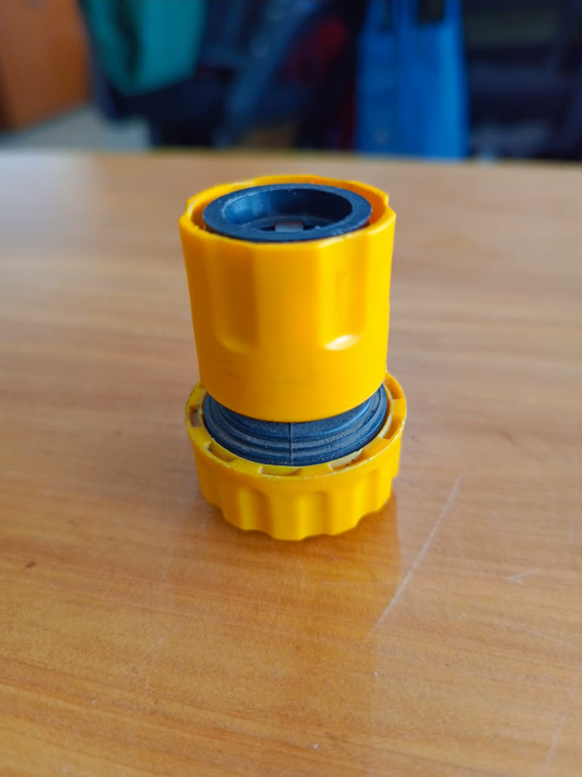 Yellow hose connector with push-fit mechanism
